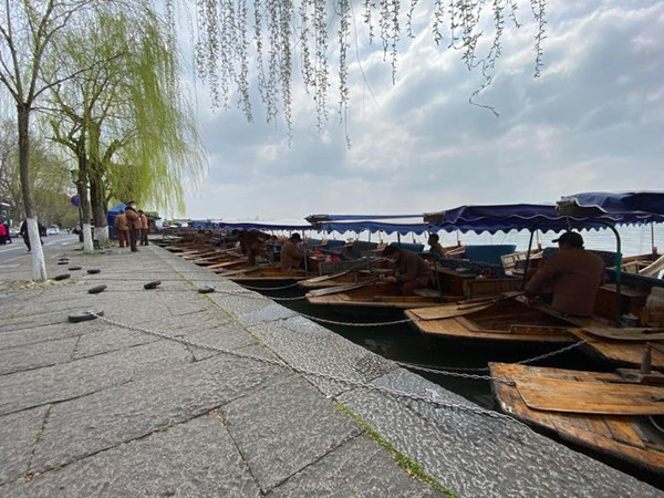 take boat for spin on west lake.jpg