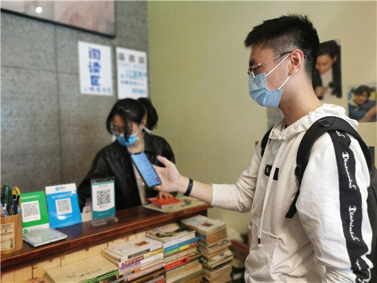 rmb goes digital in hangzhou's most bustling commercial area