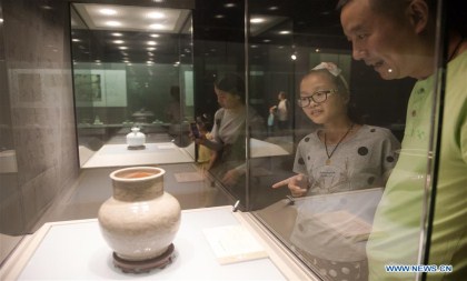 visitors view exhibits of china's song and ming dynasties in hangzhou