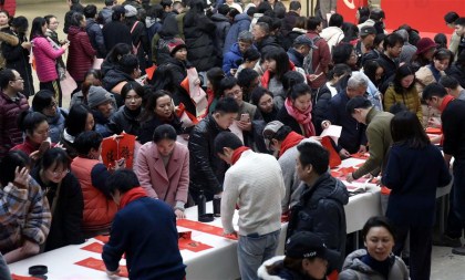 calligraphers write chinese character 