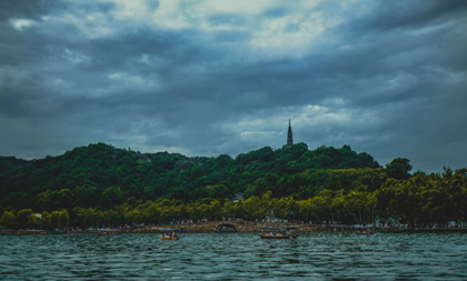 a glimpse of west lake after a summer rain